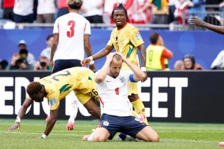 Harry Kane holds his head after missing a big chance against Ghana