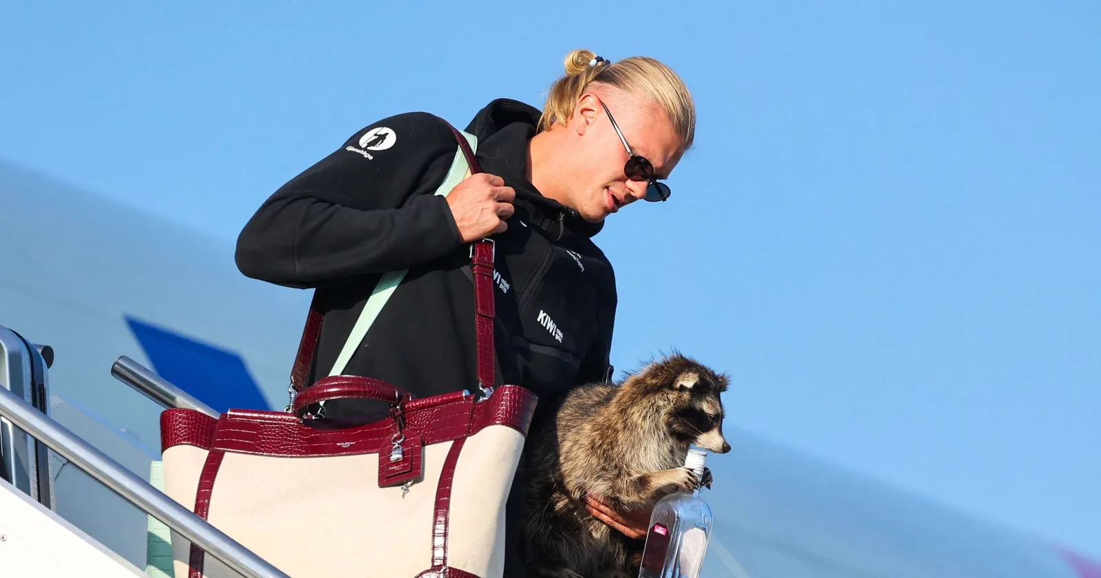 Erling Haaland Brings a Brand New Bag—and a Taxidermied Raccoon—Home to Norway - Vogue