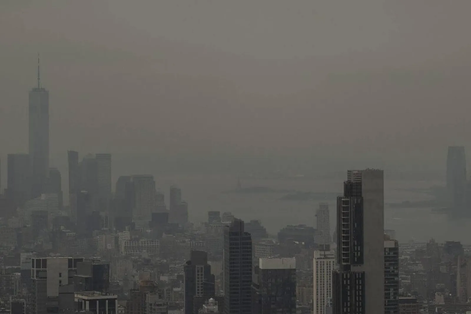 Haze from Canadian wildfires blankets the Manhattan skyline