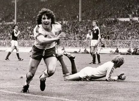 Kevin Keegan, seen here celebrating after scoring for England against Scotland in 1978, has died at the age of 75.